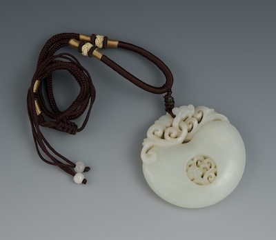 A Chinese Carved White Jade Pendant