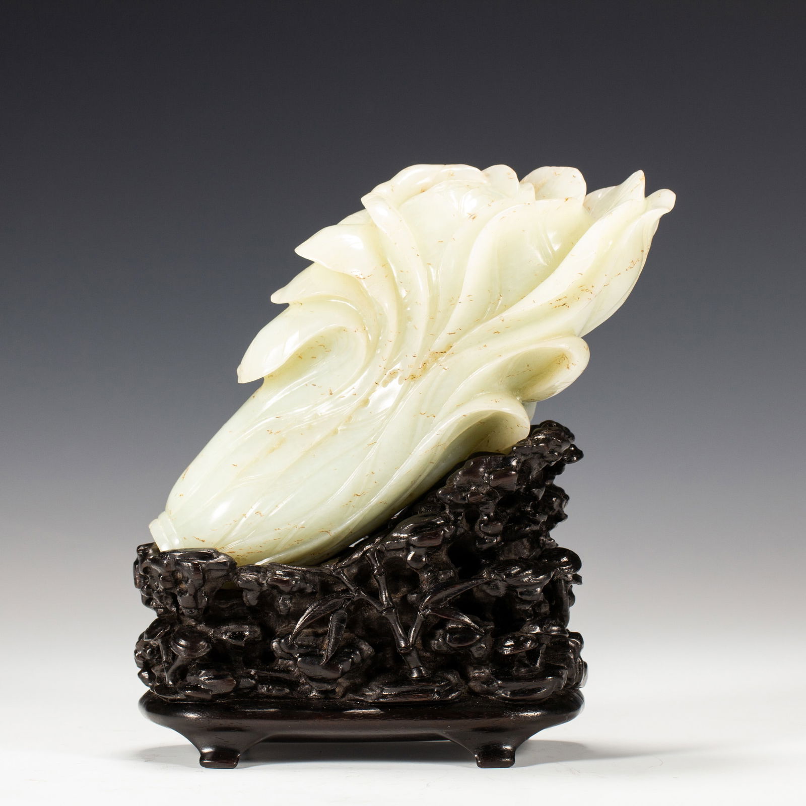 A CHINESE CARVED WHITE JADE CHINESE