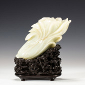 A CHINESE CARVED WHITE JADE CH