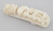 A Chinese Carved White Jade Be
