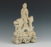 A Chinese Carved White Soapsto