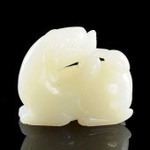 A CHINESE CARVED WHITE/PALE GR