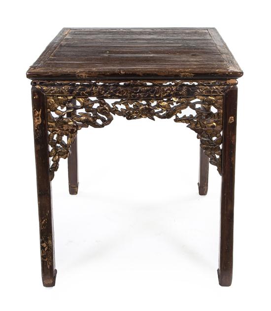 A Chinese Carved Wood and Parcel