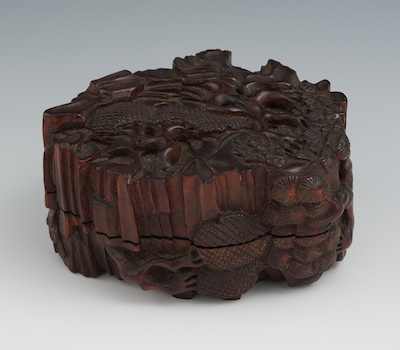 A Chinese Carved Wood Box The box