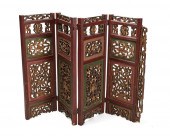 A CHINESE CARVED WOOD FOLDING