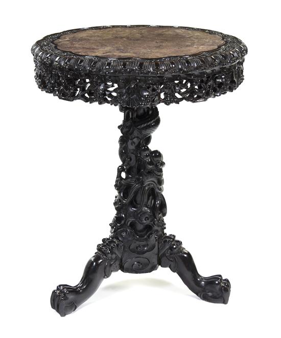 A Chinese Carved Wood Occasional