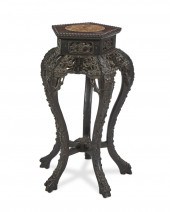 A CHINESE CARVED WOOD STANDA C