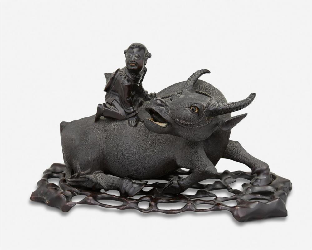 A CHINESE CARVED WOOD WATER