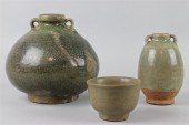 A CHINESE CELADON CUP AND TWO