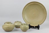 A CHINESE CELADON DISH WITH TH