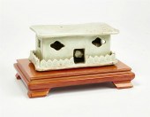A CHINESE CELADON GLAZED PORCE