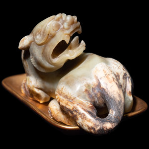 A Chinese Celadon Jade Figure of