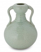 A CHINESE CERAMIC CELADON VASE