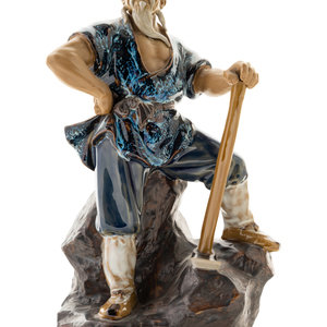 A Chinese Ceramic Figure of a Man