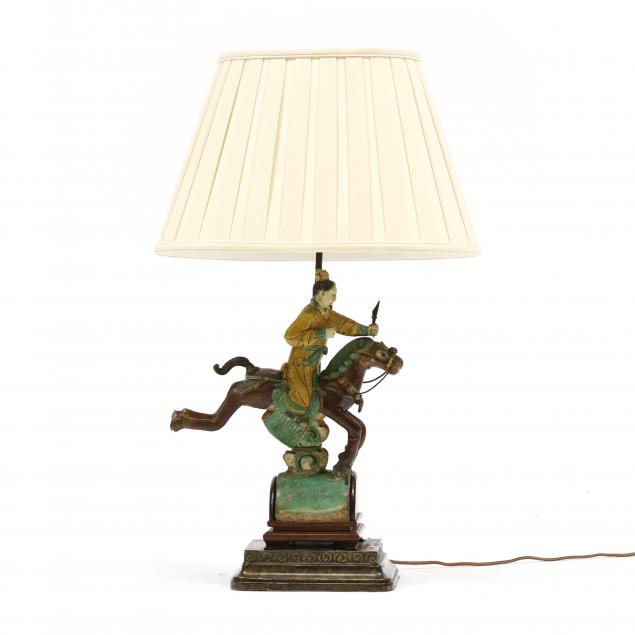 A CHINESE CERAMIC ROOF TILE MOUNTED