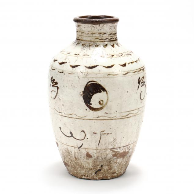 A CHINESE CIZHOU WINE JAR  A