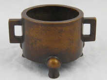 A Chinese cylindrical bronze