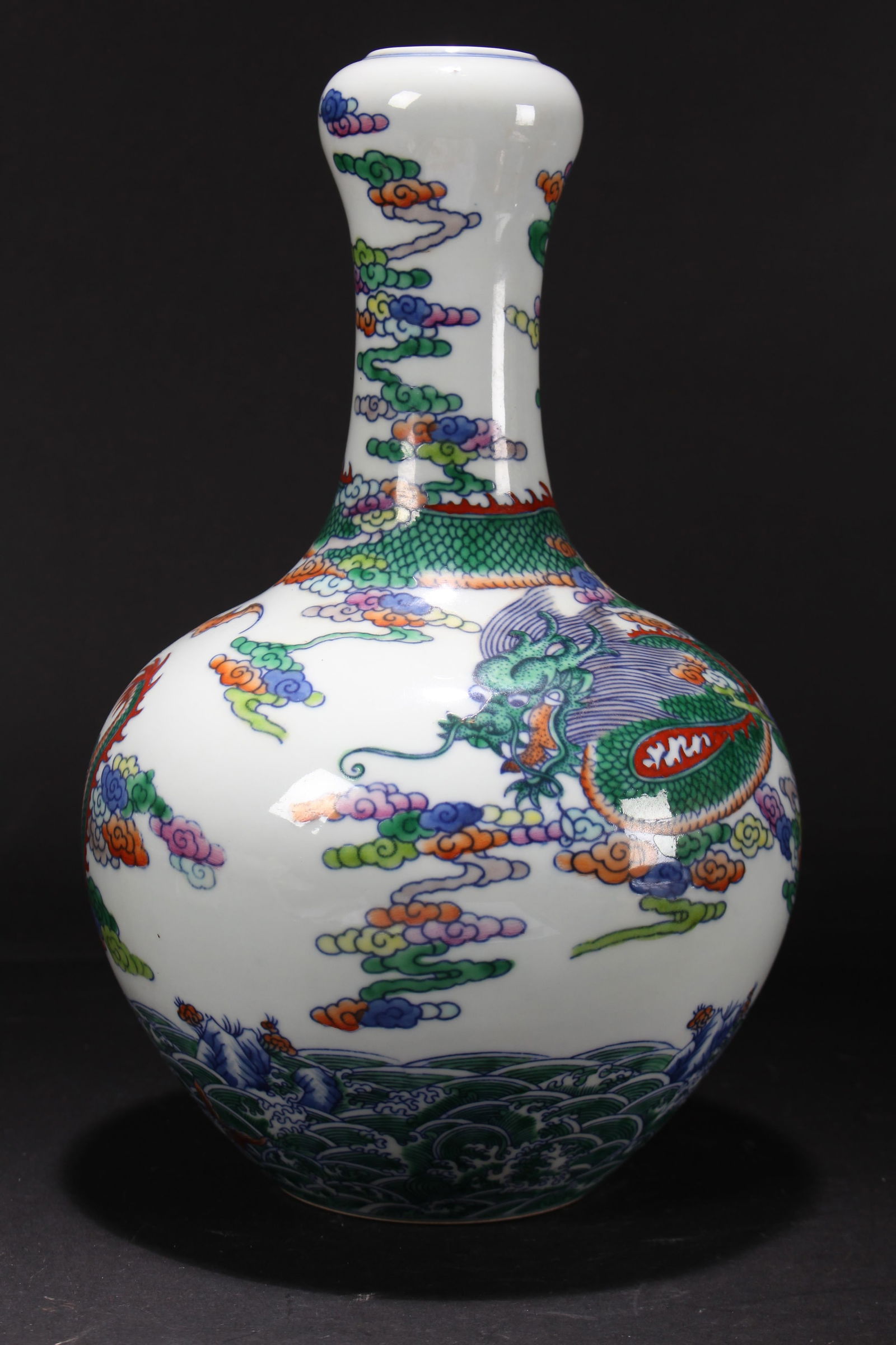 A CHINESE DRAGON-DECORATING