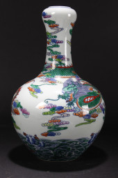 A CHINESE DRAGON-DECORATING PO