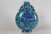 A CHINESE DRAGON-DECORATING PO