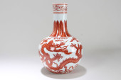 A CHINESE DRAGON-DECORATING RE