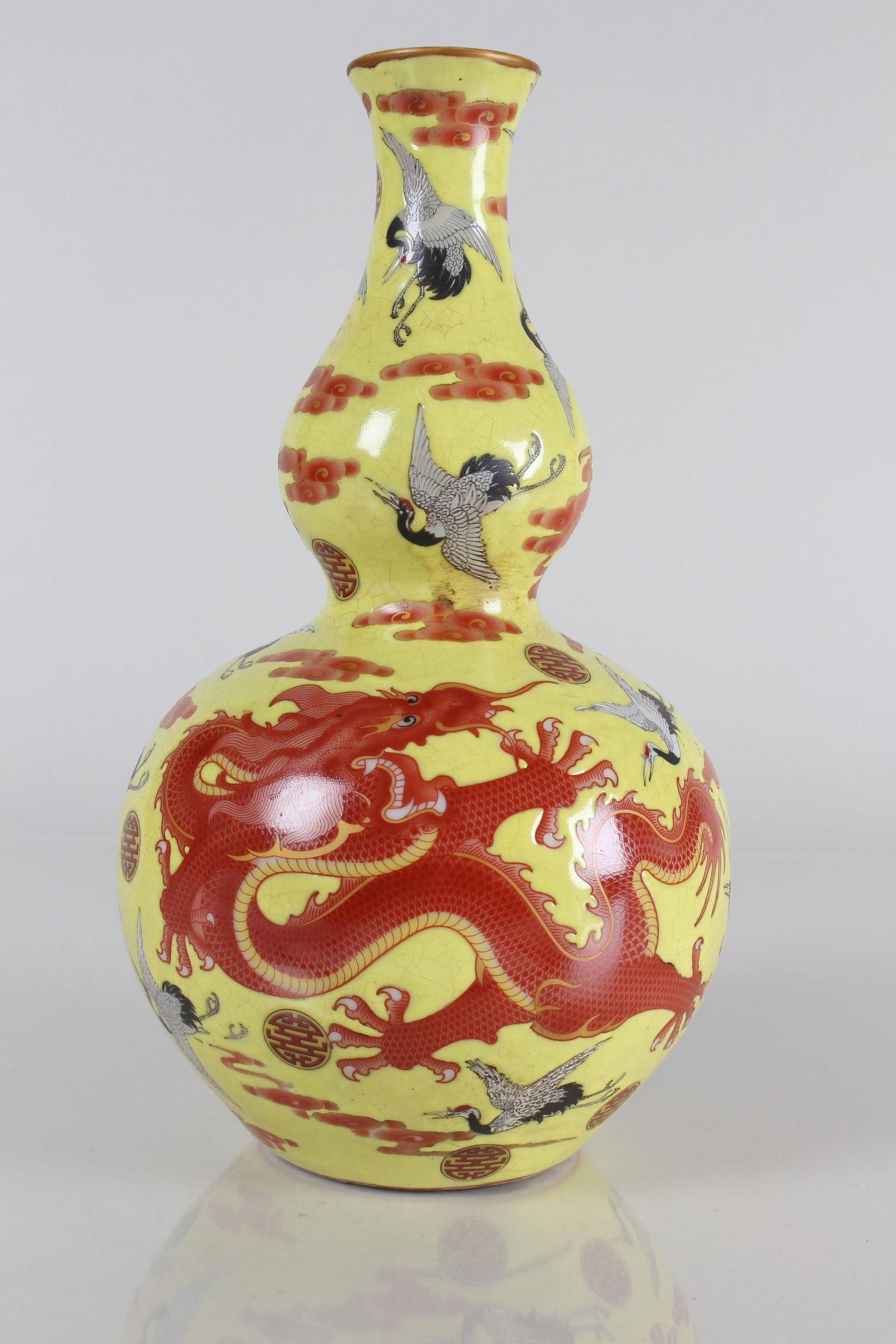 A CHINESE DRAGON-DECORATING