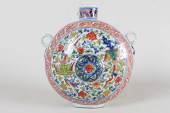 A CHINESE DUO-HANDLED ANCIENT-
