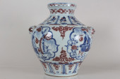 A CHINESE DUO-HANDLED ANCIENT-