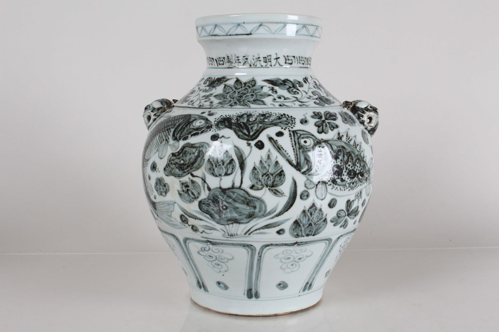 A CHINESE DUO-HANDLED AQUA-THEME