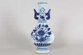 A CHINESE DUO-HANDLED BLUE AND