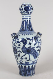 A CHINESE DUO-HANDLED BLUE AND