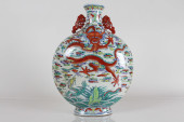 A CHINESE DUO-HANDLED DETAILED