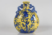 A CHINESE DUO-HANDLED DETAILED