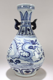 A CHINESE DUO-HANDLED DRAGON-D