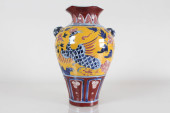 A CHINESE DUO-HANDLED PORCELAI