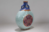 A CHINESE DUO-HANDLED VIVIDLY-