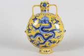 A CHINESE DUO-HANDLED YELLOW-C