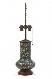 A CHINESE ENAMELED VASE NOW AS