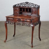 A CHINESE EXPORT CARVED HARDWO