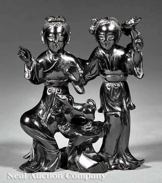 A Chinese Figural Group of Two