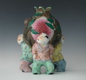 A Chinese Figurine of Three Ch