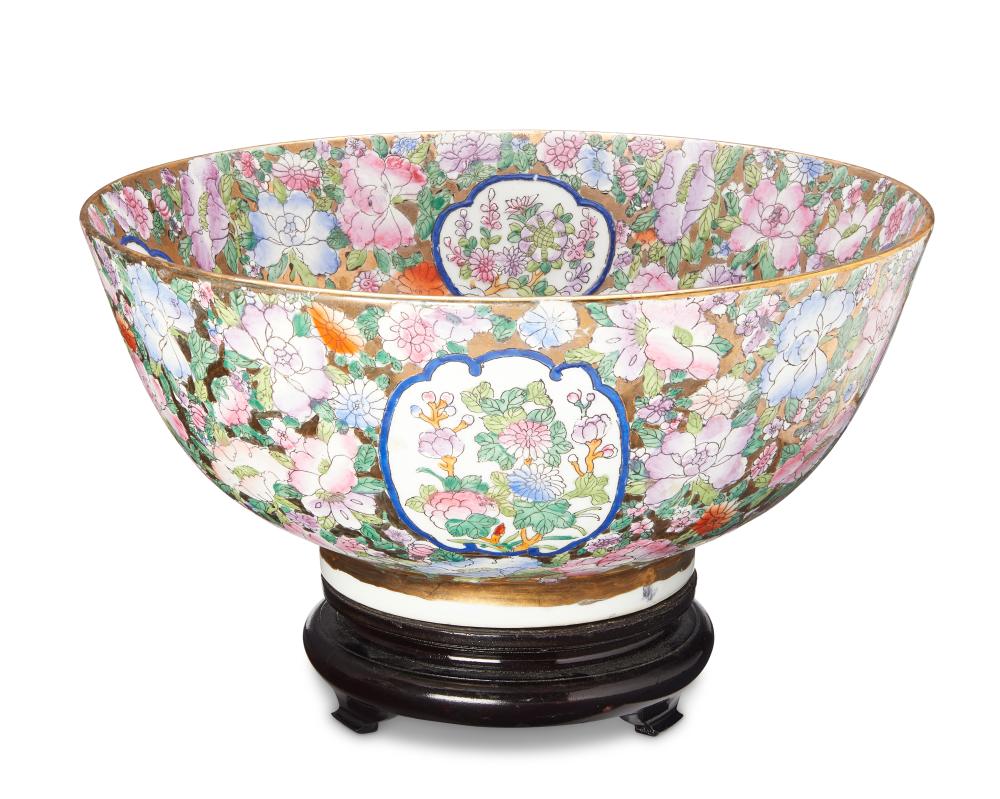 A CHINESE GILT AND POLYCHROME