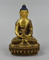 A CHINESE GILT BRONZE FIGURE O