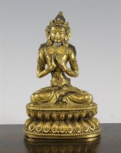 A Chinese gilt bronze seated f