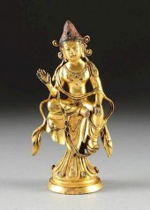 A CHINESE GILT BRONZE SEATED F