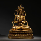 A CHINESE GILT BRONZE STONES I