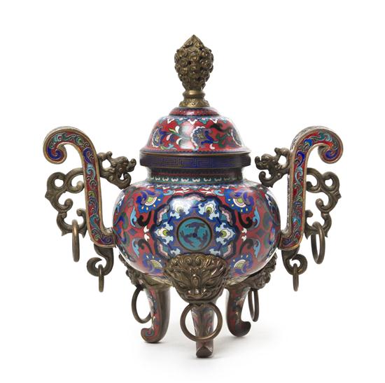 * A Chinese Gilt Copper and