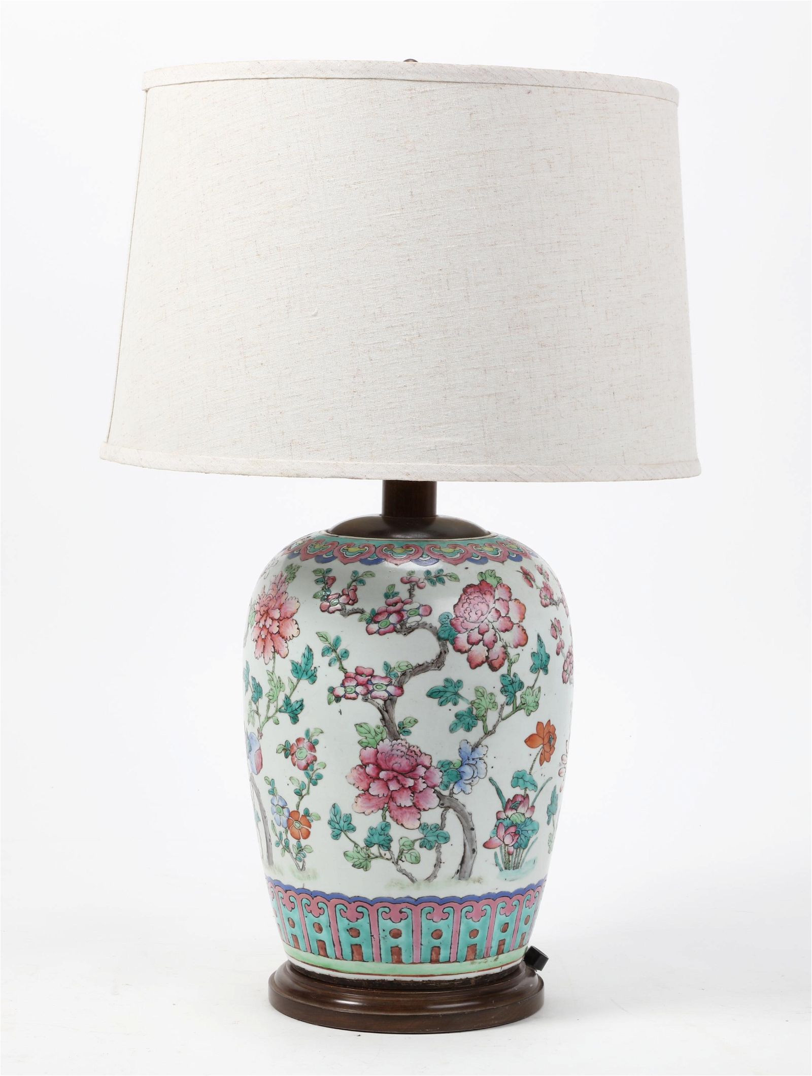 A CHINESE GINGER JAR WITH FLORA AND