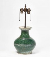 A CHINESE GREEN GLAZED STORAGE