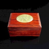 A CHINESE GREEN JADE MOUNTED H